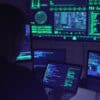 Hacker working on a computer showing AI tools used by foreign adversaries