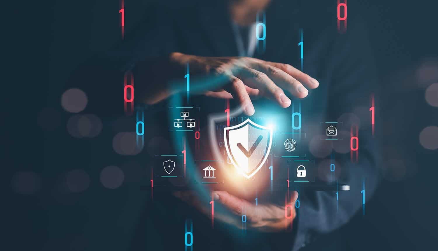 Hands over shield showing cyber insurance
