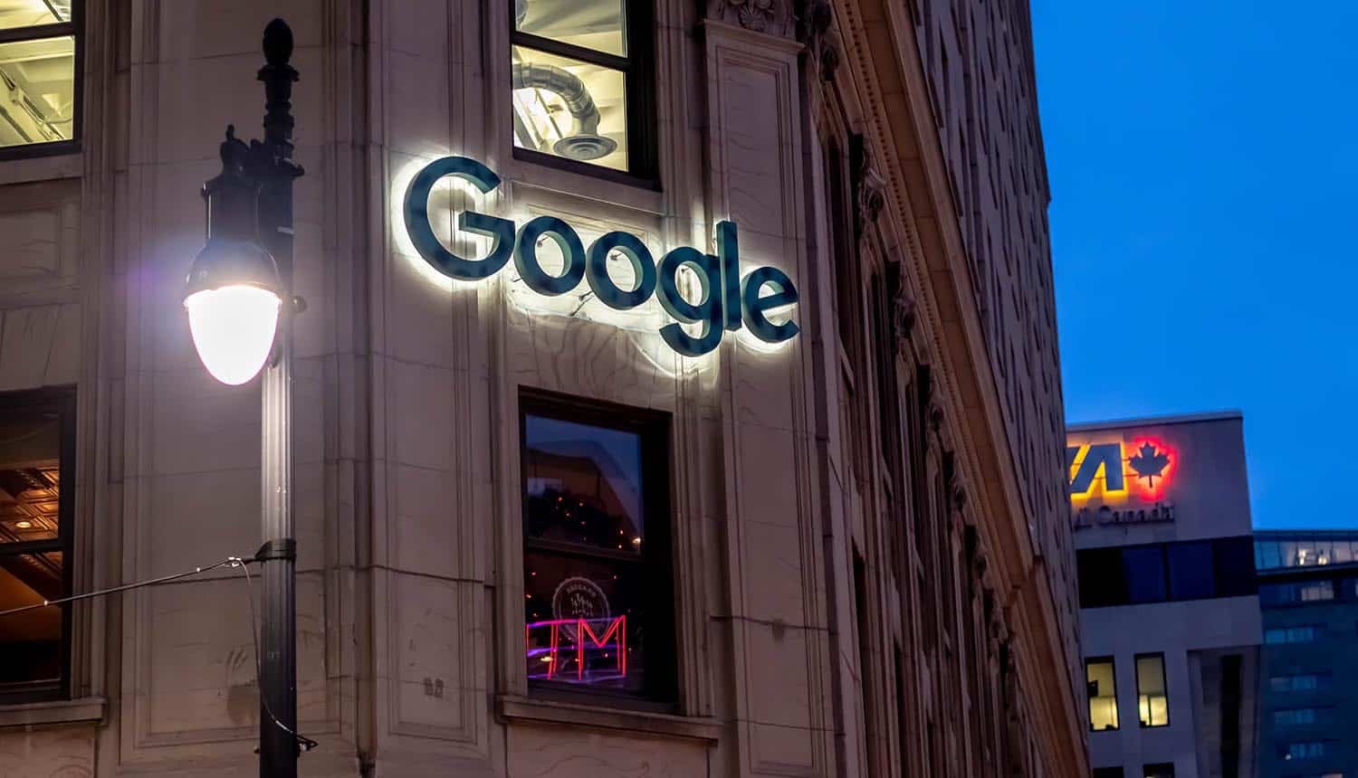 Google logo on building showing AI assistant lawsuit