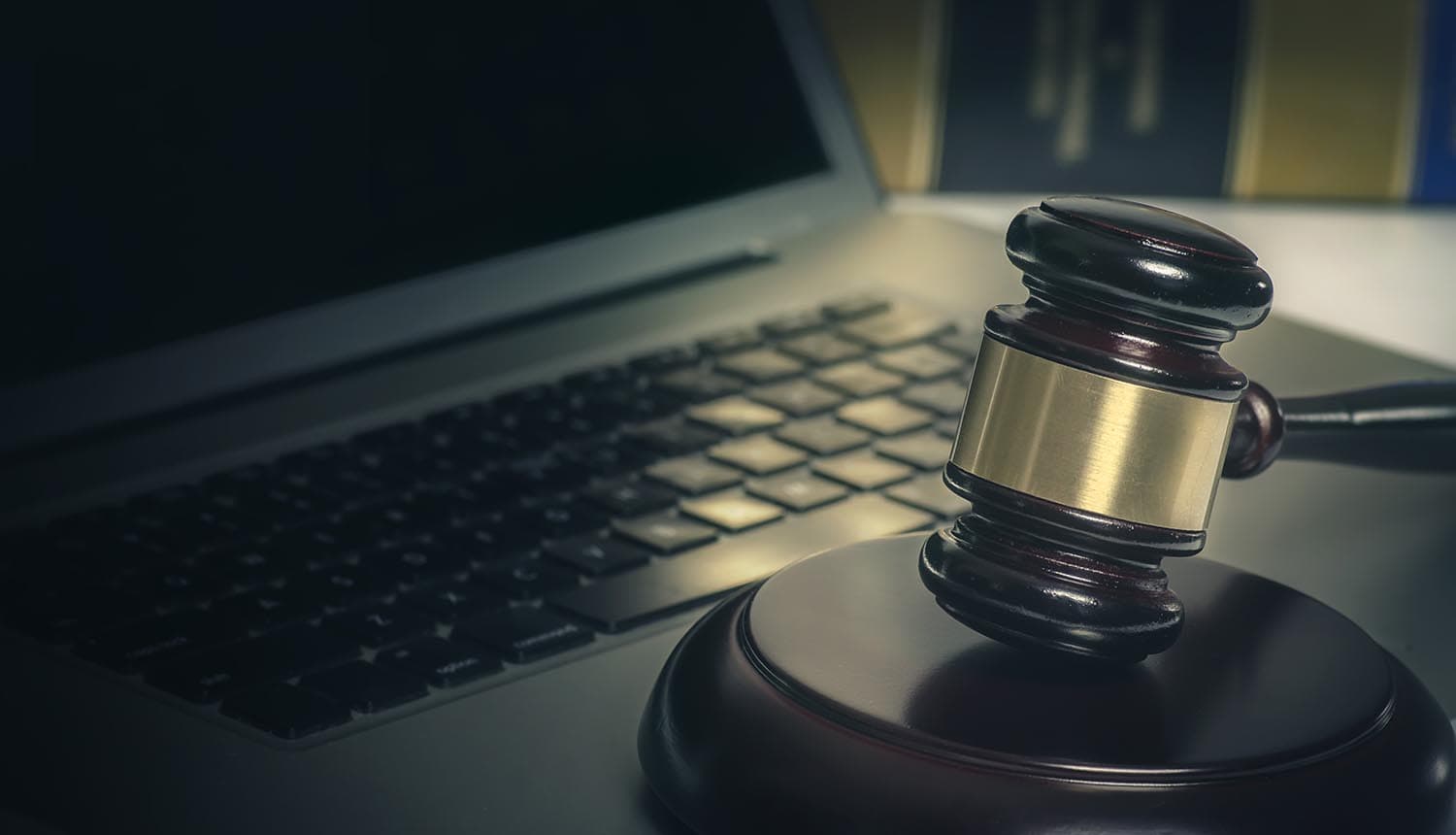 Hammer and laptop showing SEC civil actions