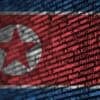 North Korea flag on the screen showing North Korean hackers deploy npm packages