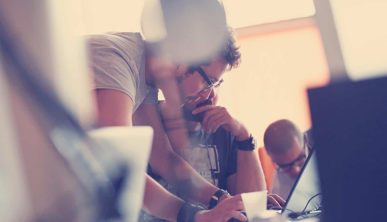 People working in office showing cybersecurity training
