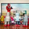 Retro robots watch TV showing data leak