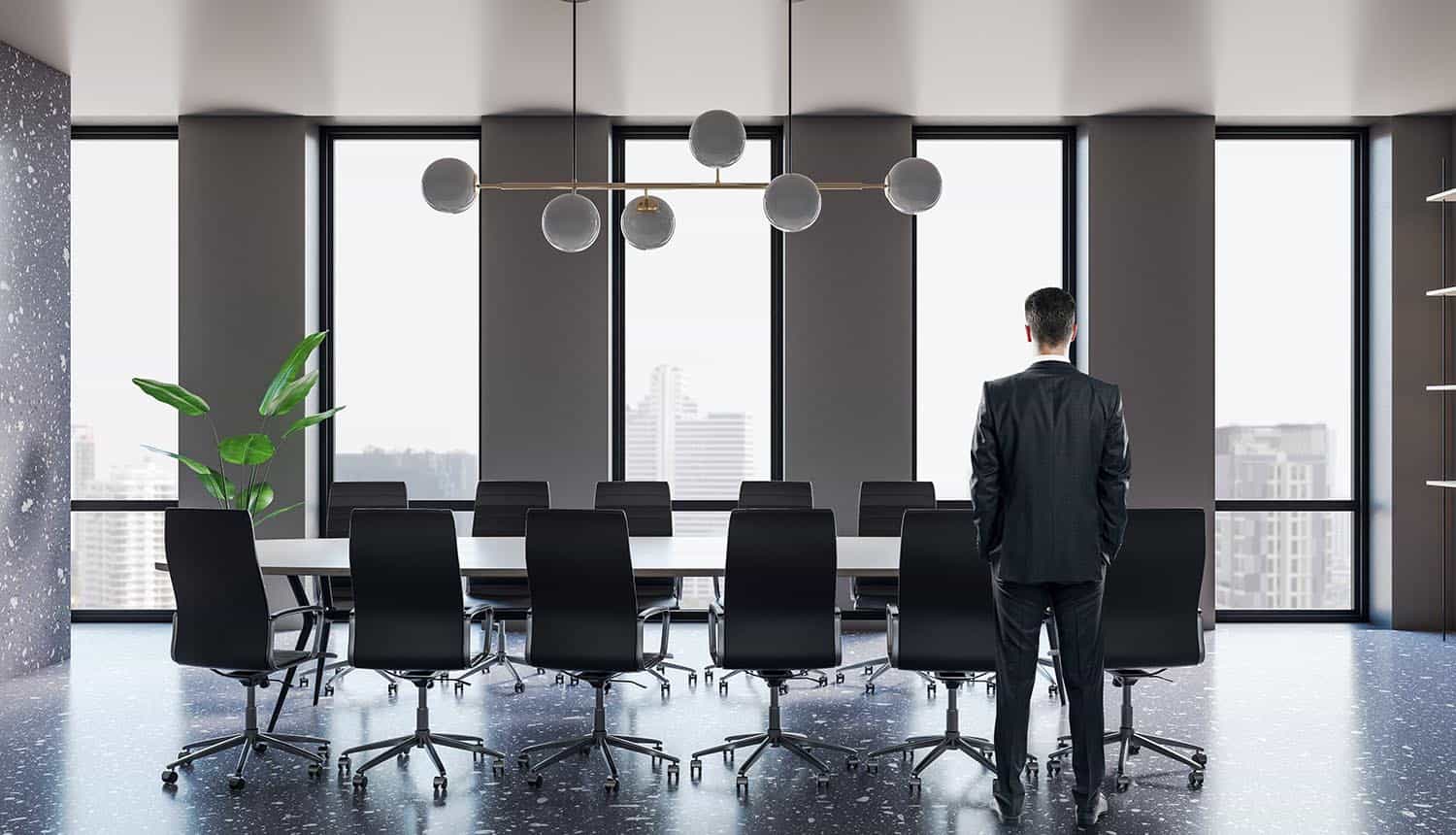 CISO standing in board meeting room