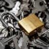 Open padlock on a bunch of keys showing credentials leak