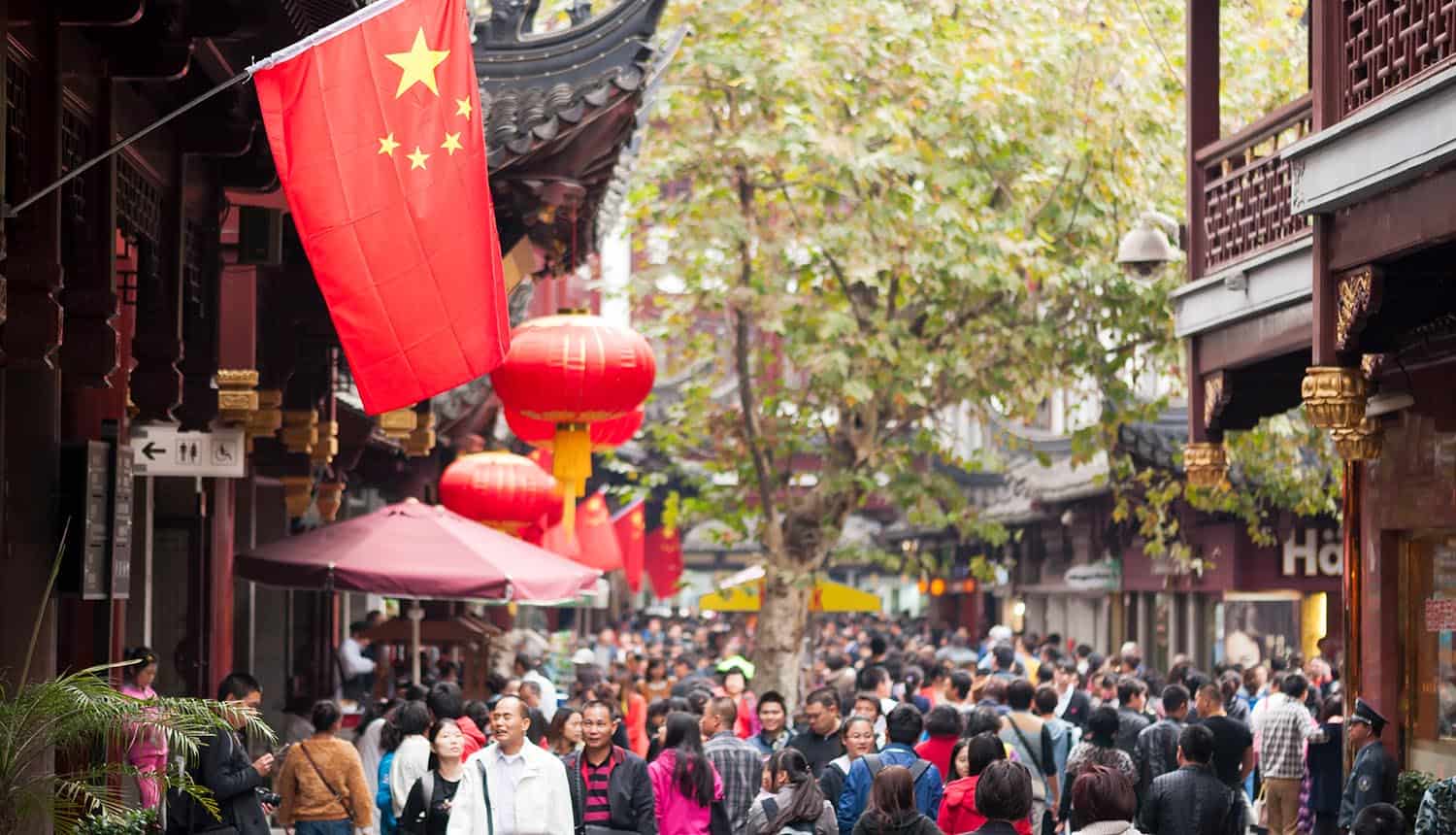 Chinese flag in a crowded street showing data leak