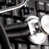 Stethoscope on top of computer showing healthcare data breach