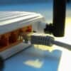 Connected cable to internet router showing national security risks