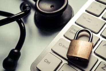 Stethoscope on keyboard showing data breach of health data