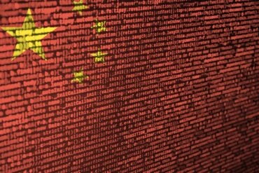 China flag on the screen showing FBI surveillance system cyber incident