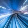 Motion blur of train moving inside tunnel showing security breach of high-speed rail