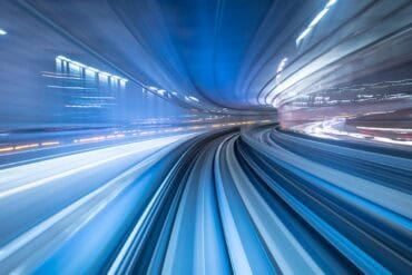 Motion blur of train moving inside tunnel showing security breach of high-speed rail