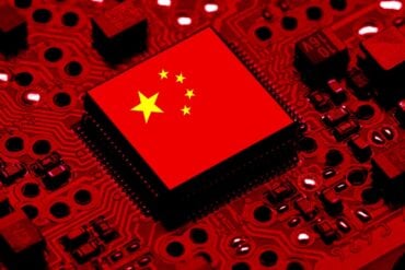 Chinese flag on chip showing Chinese hackers breached research facilities