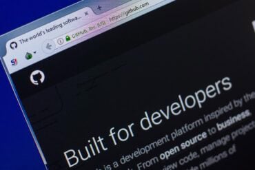 GitHub website on screen showing supply chain attack on GitHub repositories