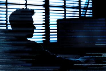 Hacker working showing third-party data breach