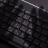 Shadow of hand on keyboard showing Copilot vulnerability and data theft