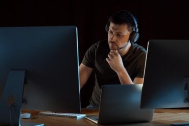 Man with headphones showing data breach of music platform