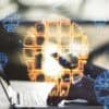 Hands on laptop showing data breach