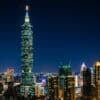 Taipei skyline at night showing autonomous AI cyber attack by Chinese hackers