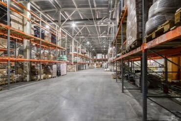 Large warehouse showing data breach disrupts operations
