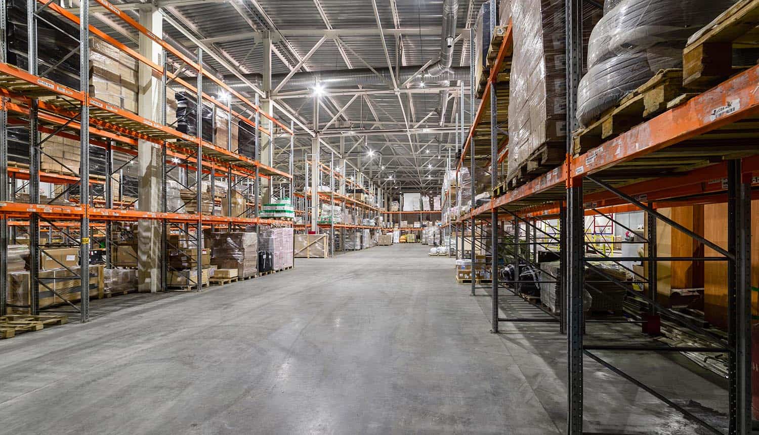 Large warehouse showing data breach disrupts operations