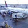 Delta aircraft at the gate showing Wi-Fi networks hacked by DEF CON attendees