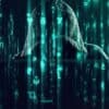 Hacker working showing employee databases data breach