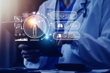 Doctor working with digital medical interface showing medical data breach