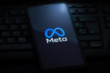 Meta logo on smartphone screen showing AI model hacking security vulnerability