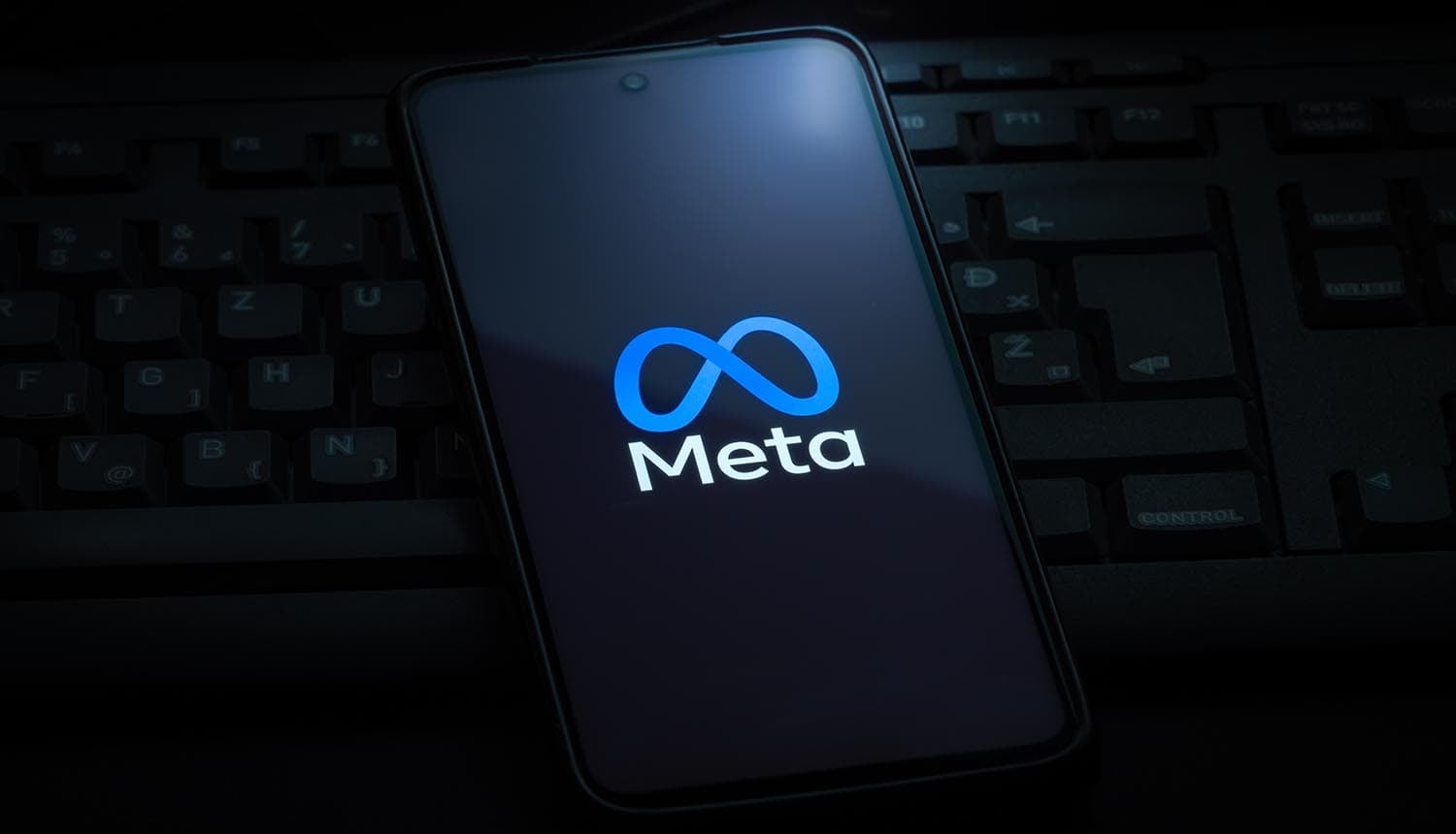 Meta logo on smartphone screen showing AI model hacking security vulnerability