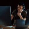 Hacker working in office showing cyber ops