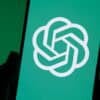 OpenAI logo on phone showing security safeguards for AI model