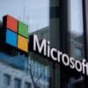 Microsoft logo at office building showing Microsoft CoPilot AI assistant