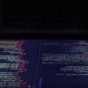 Screen of laptop showing AI agents cyber attack