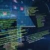 Hacker working on computer showing ransomware gang
