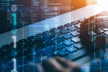 Developer working on keyboard showing AI coding agents data leak