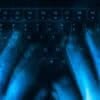 Hands on keyboard showing data breach