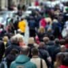 Crowd of people on the street showing data breach of population registry