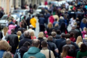 Crowd of people on the street showing data breach of population registry
