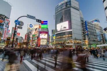 Crowd at Shibuya crossing showing data breach and ransomware attack