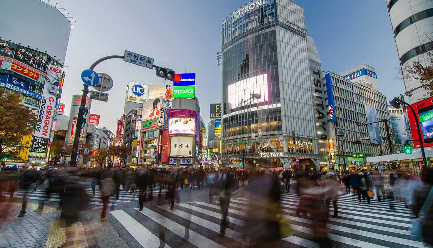 Crowd at Shibuya crossing showing data breach and ransomware attack