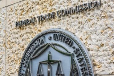 Federal Trade Commission seal on wall showing FTC investigation into AI safety
