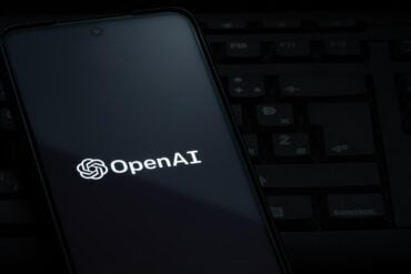 OpenAI logo on smartphone showing AI and recording device