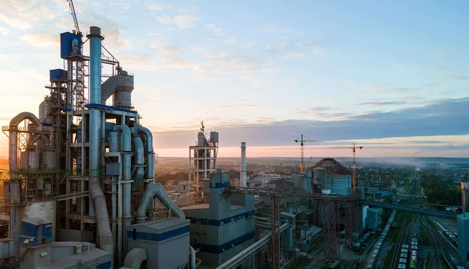 Aerial view of factory tower showing ransomware and critical infrastructure